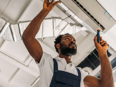 Low angle view of african american handyman repair